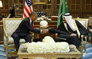 U.S. President Barack Obama (L) shakes hands with Saudi Arabia's King Salman at the start of a bilateral meeting at Erga Palace in Riyadh, Saudi Arabia, January 27, 2015. To match Special Report SAUDI-MILITARY/ REUTERS/Jim Bourg/File Photo