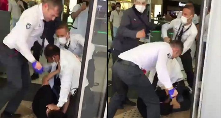 AVM'de maske takmayan bir kişiyle güvenlik görevlileri tekme tokat kavga ettiler